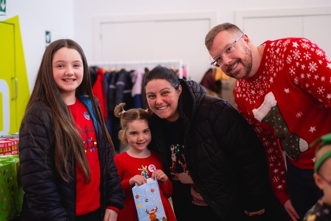 Group shot of a family at the Worcestershire Acute Hospitals Charity Christmas Party