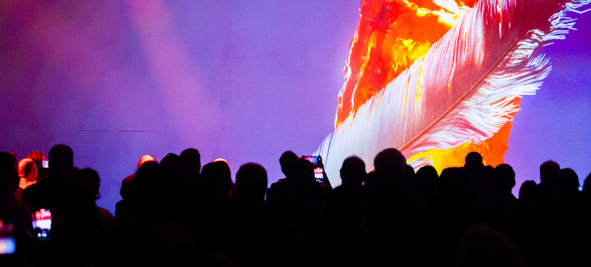 Shot of a crowd watching the 4D immersive experience at the PPC Commercial Conference Athens.