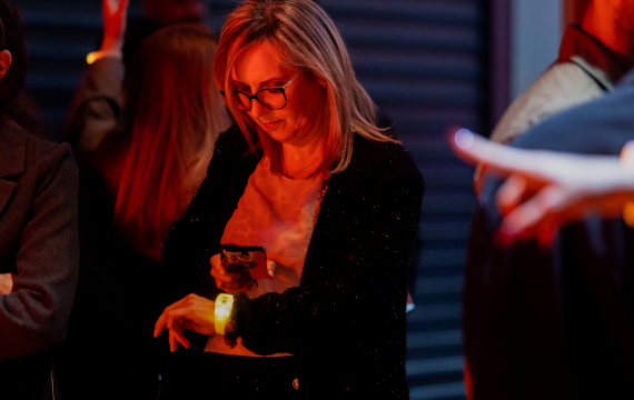 Picture of someone using the colour changing wristband at the PPC Commercial Conference Athens.