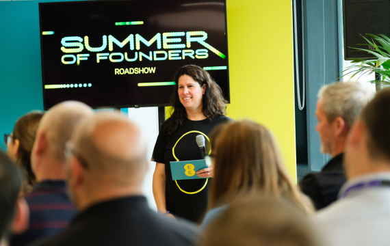 Shot of a woman presenting at the EE Summer of Founders roadshow