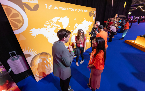 Shot of people interacting at one of the Tesco Live zones.