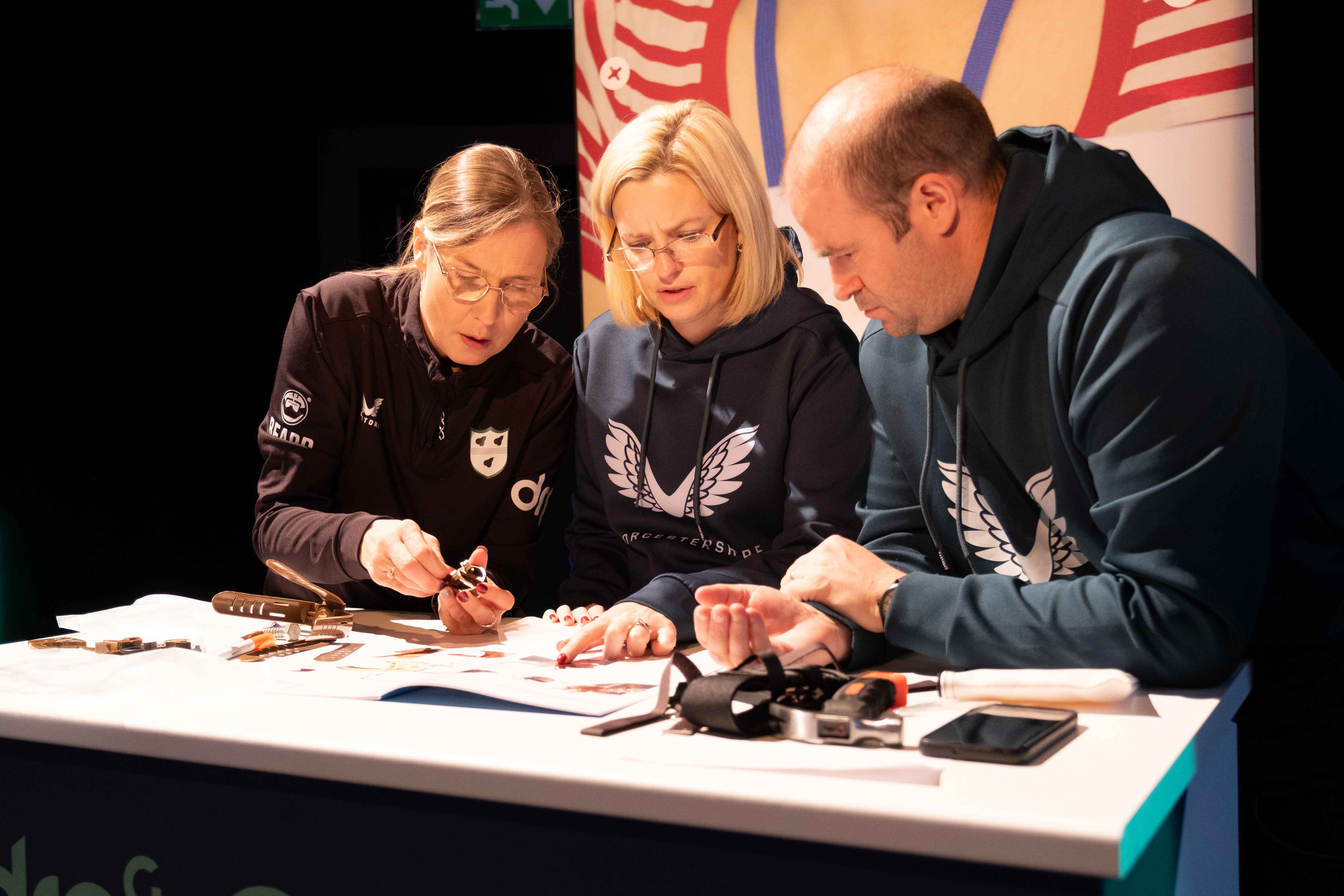 Close up of particpants building hands at DRPGs Big Build